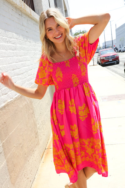 Beautiful You Coral Floral & Border Print Smocked Dress