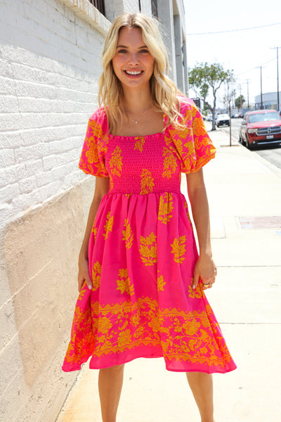 Beautiful You Coral Floral & Border Print Smocked Dress