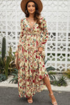 Model wearing size small boho floral maxi dress with frill details, long sleeves, and plunging neckline – front view.