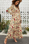 Side view of model wearing size small boho floral maxi dress, showing flowy A-line skirt and flounce sleeves.