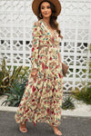 Side view of model wearing size small boho floral maxi dress, showing flowy A-line skirt and flounce sleeves.