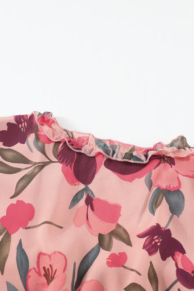 Close up on fabric and frill of skirt on pink modest ruched dress