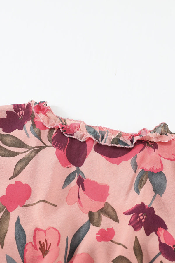 Close up on fabric and frill of skirt on pink modest ruched dress
