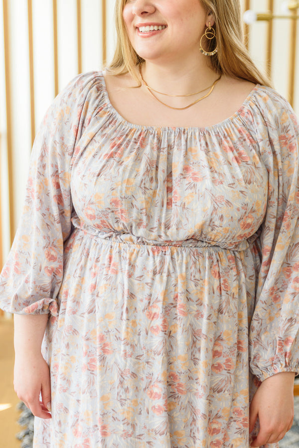  Close-up of fitted bodice and elastic waist on Dreamscape floral midi dress, size 1XL
