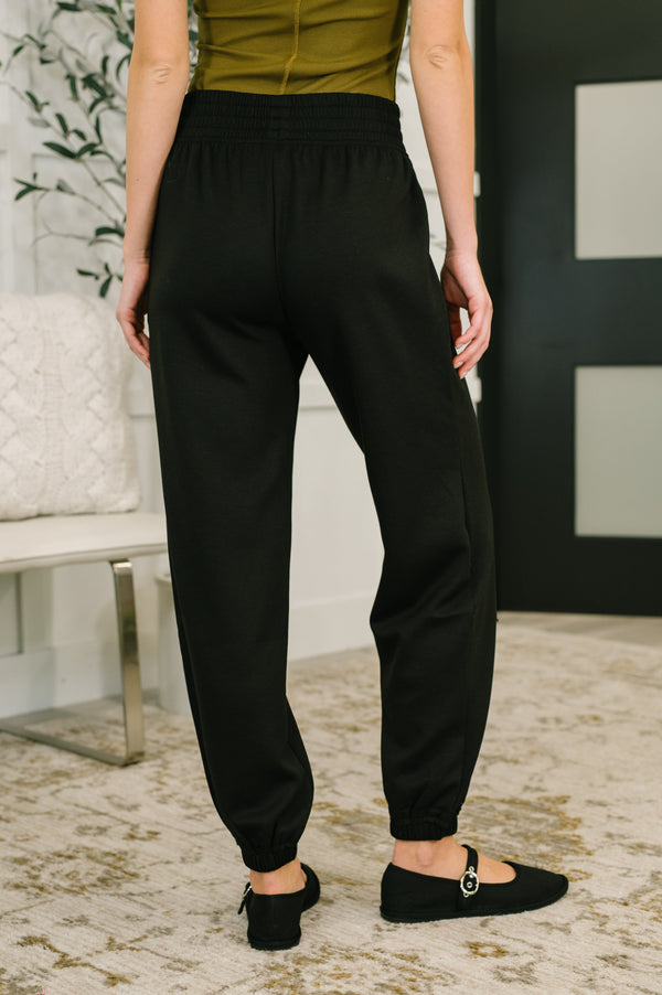 Every Second, Every Hour Jogger Bottoms in Black