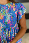 Flirt Alert Flutter Sleeve Top in Blue