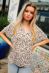 Best In Bold Ivory Animal Print V Neck Dolman Side Slit Top