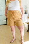 sandy brown beach shorts, modest clothing, modest clothes