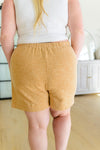 sandy brown beach shorts, modest clothing, modest clothes