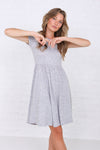  Modest knee-length fit and flare dress with elastic waist in soft polyester-spandex fabric.