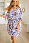 Summer Sonnet Floral Dress front view on size small model – modest retro floral dress with v-neck and smocked waist