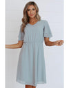 Modest chiffon dress with tiered sleeves, soft V-neckline, elastic cinched waist, and knee-length hem in lightweight breathable polyester.